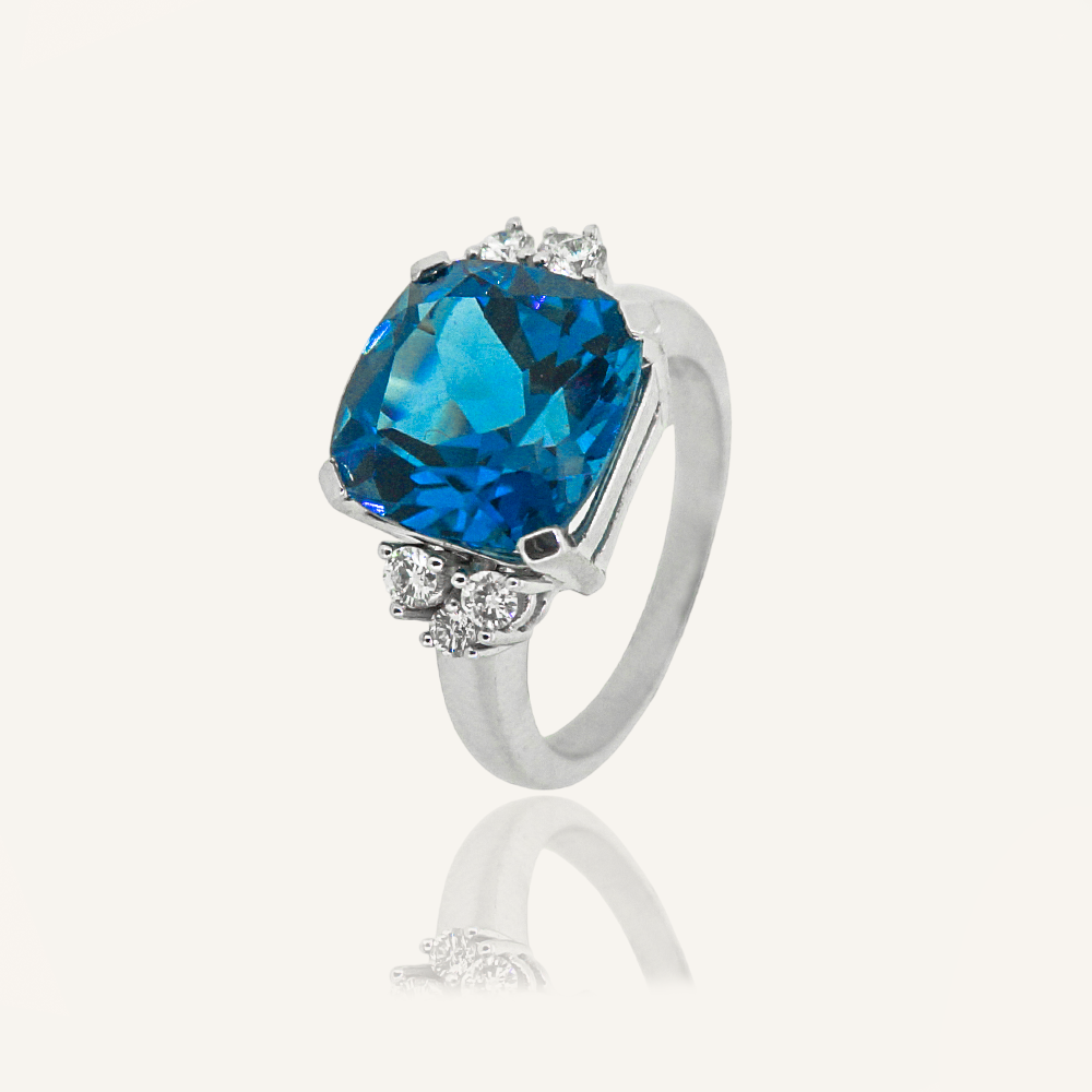 Anillo ASYMMETRY Topacio London Blue cojín y brillantes OB