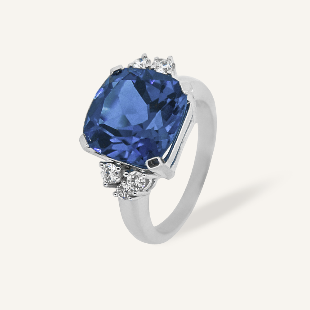 Anillo ASYMMETRY Topacio London Blue cojín y brillantes OB