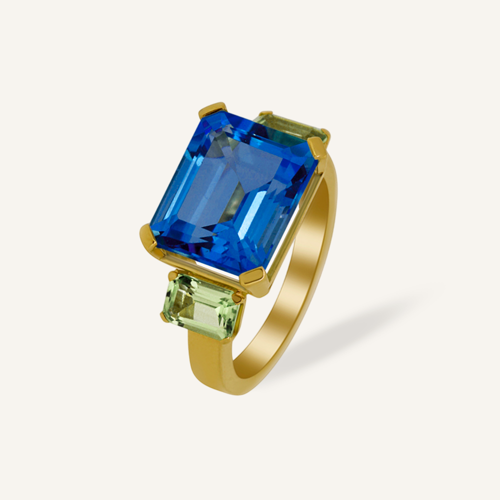 Anillo TRILOGY Topacio London blue y Peridotos verdes OA