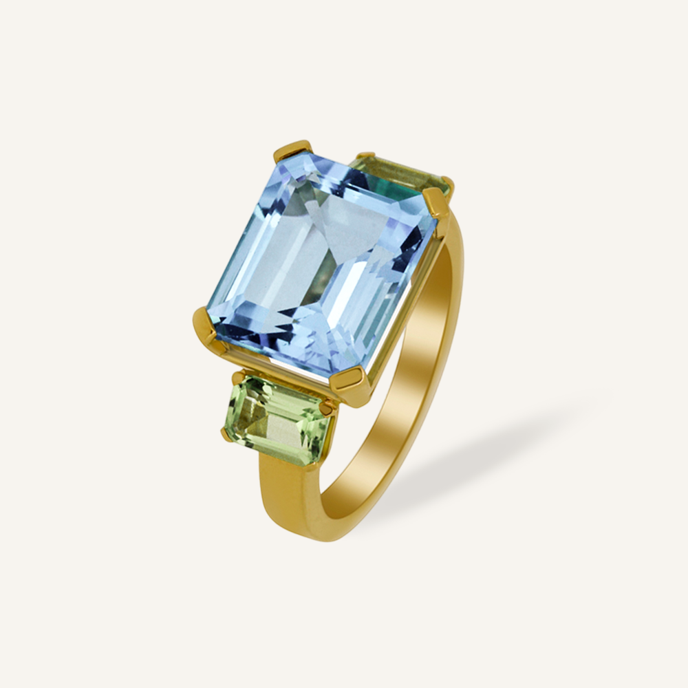 Anillo TRILOGY Topacio Sky rectangular apaisado y Peridotos OA